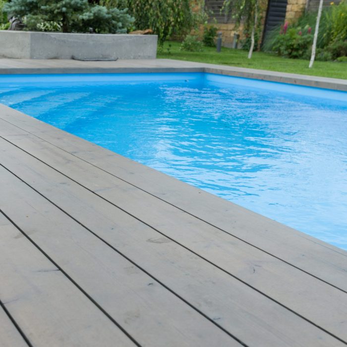 Special wooden board around the swimming pool